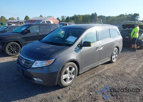 2013 Honda Odyssey Touring/Touring Elite z USA, uszkodzony, nr VIN 5FNRL5H9XDB028698